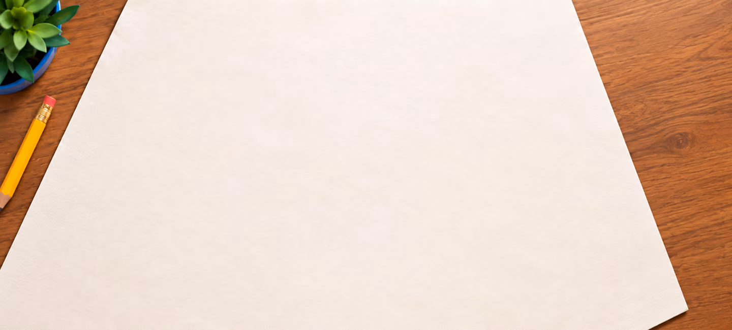 Blank sheet of white paper laid on a wooden desk with a yellow pencil and green succulent plant in a blue pot on the upper left corner.